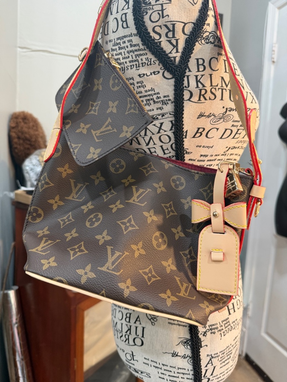 Lv  Brown Monogram Canvas with Red Trim and Beige Tag